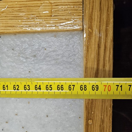 Wet sheet of seed paper on a mould with a measuring tape – format up to 70 cm