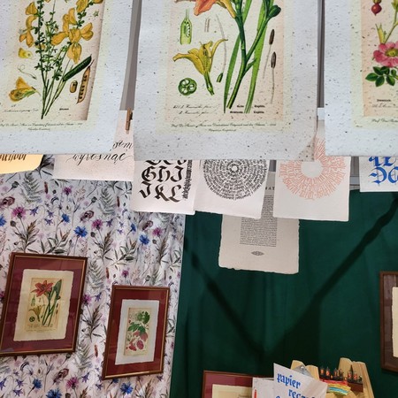 Botanical illustrations and calligraphy on handmade paper at the ART-PAPIER stand