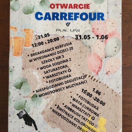 Plakat A5 „Wielkie otwarcie Carrefour Plac Unii” wydrukowany na papierze z nasionami
